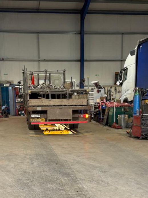 HGV inside the workshop for diagnostics and maintenance.